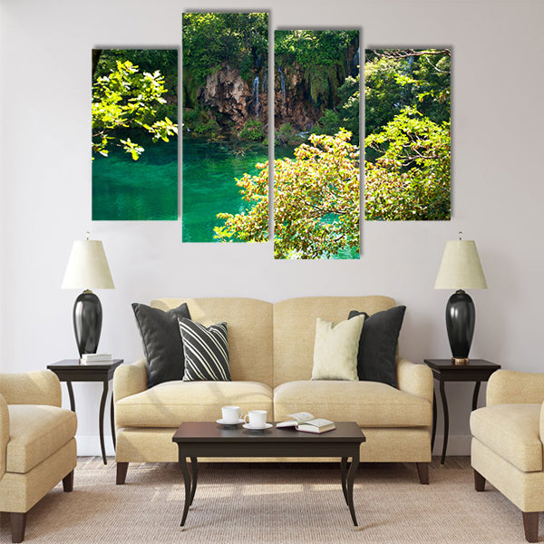 Lake with transparent emerald water multi panel canvas wall art