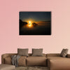 Lake Chicot is bathed in golden sunrise multi panel canvas wall art