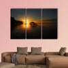 Lake Chicot is bathed in golden sunrise multi panel canvas wall art