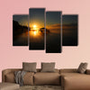 Lake Chicot is bathed in golden sunrise multi panel canvas wall art