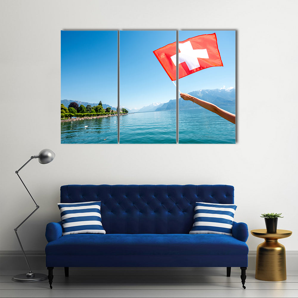 Female Hand Holding Switzerland Flag On Geneva Lake Multi Panel Canvas Wall Art