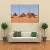 The pyramids of Meroe in the Sahara of Sudan Multi Panel Canvas Wall Art