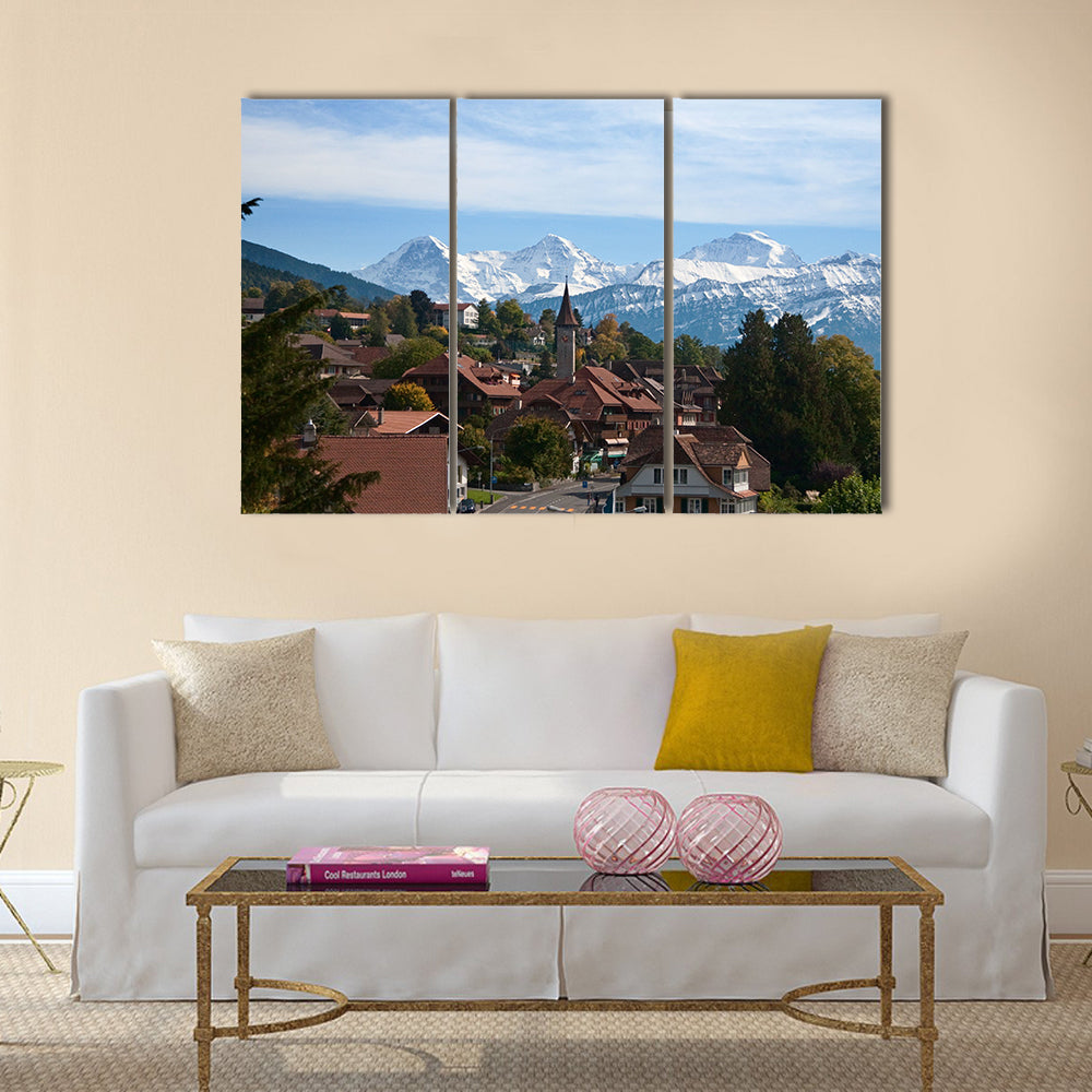 Typical swiss village with snowy peaks multi panel canvas wall art