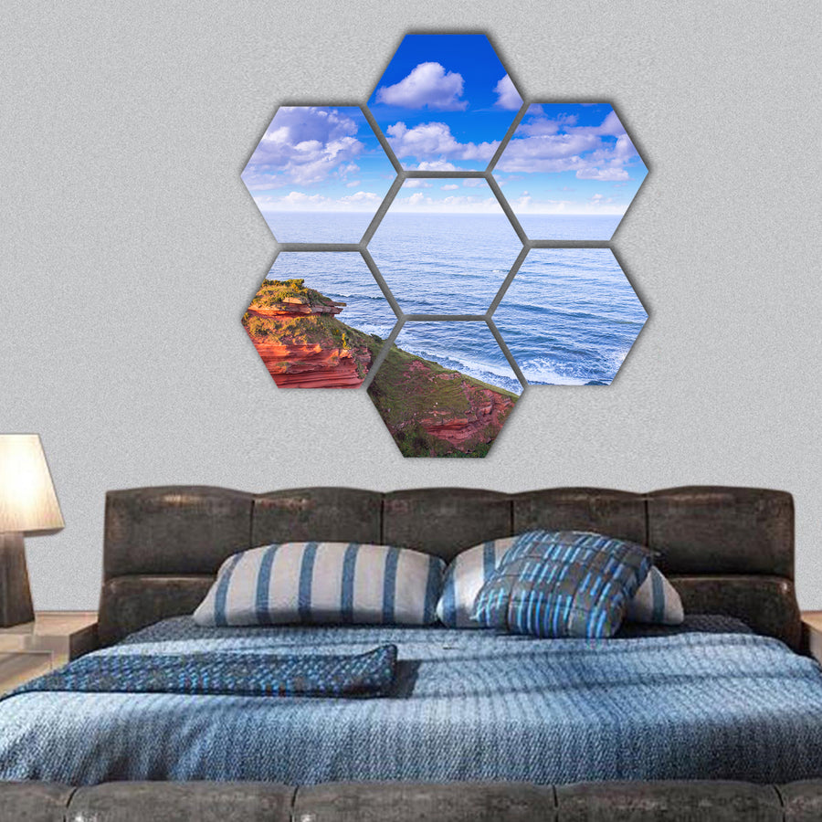 Red layered cliffs of Scotland's South-East coast hexagonal canvas wall art