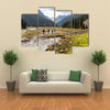 A Group Of Hikers Climbing On The Tein Shan Mountains In Kyrgyzstan Multi Panel Canvas Wall Art