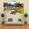 A Group Of Hikers Climbing On The Tein Shan Mountains In Kyrgyzstan Multi Panel Canvas Wall Art