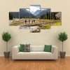 A Group Of Hikers Climbing On The Tein Shan Mountains In Kyrgyzstan Multi Panel Canvas Wall Art