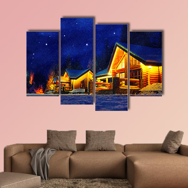 Snowy winter scene of a cabin in distance at night multi panel canvas wall art