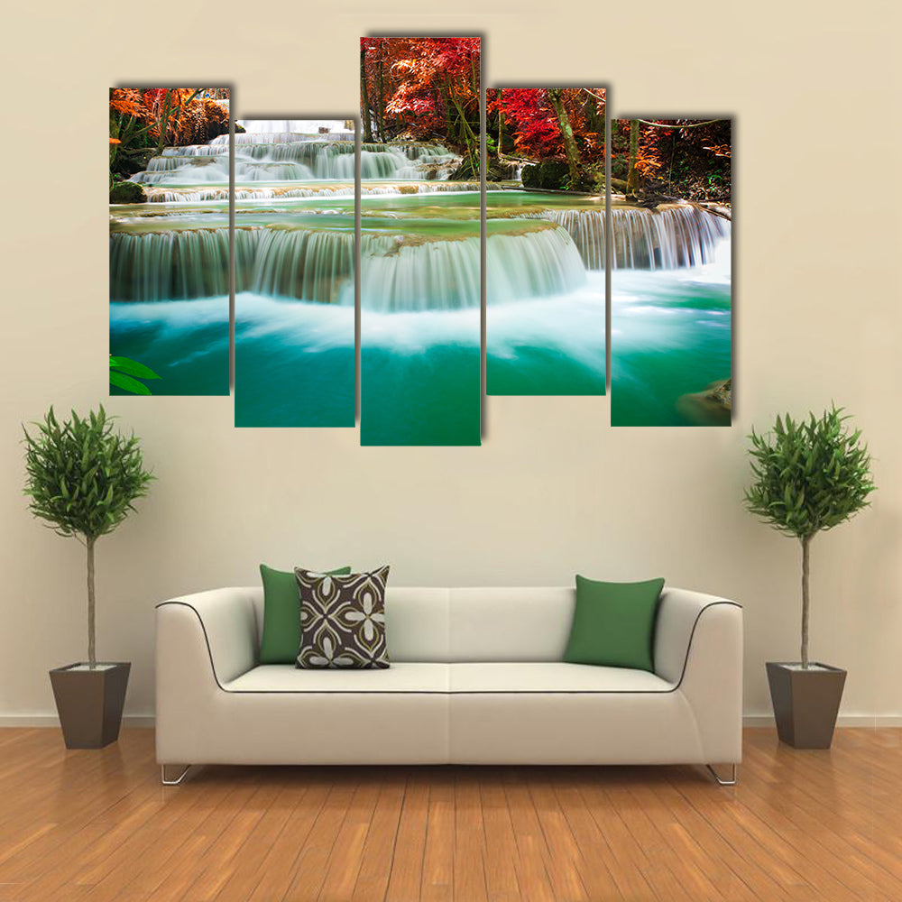 Beautiful waterfall in autumn tree forest multi panel canvas wall art