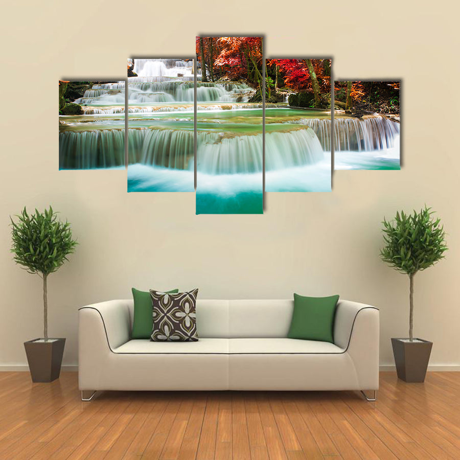 Beautiful waterfall in autumn tree forest multi panel canvas wall art