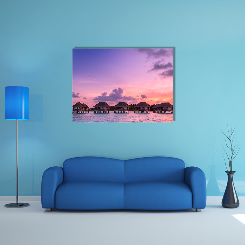 The Beauty Of the Sunrise Over Water Bungalows On A Cloudy day, Maldives Multi Panel Canvas Wall Art