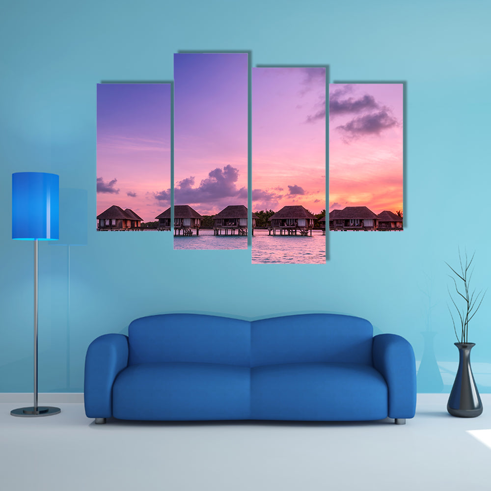 The Beauty Of the Sunrise Over Water Bungalows On A Cloudy day, Maldives Multi Panel Canvas Wall Art