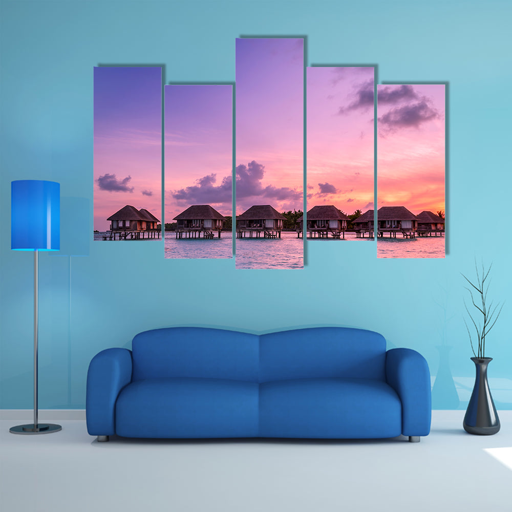 The Beauty Of the Sunrise Over Water Bungalows On A Cloudy day, Maldives Multi Panel Canvas Wall Art