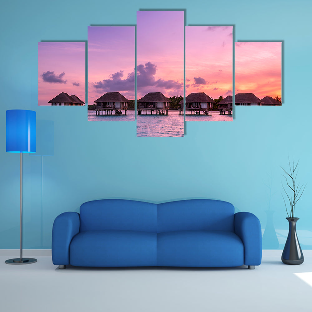 The Beauty Of the Sunrise Over Water Bungalows On A Cloudy day, Maldives Multi Panel Canvas Wall Art