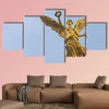 The Angel of Independence against the sky in Mexico City multi panel canvas wall art