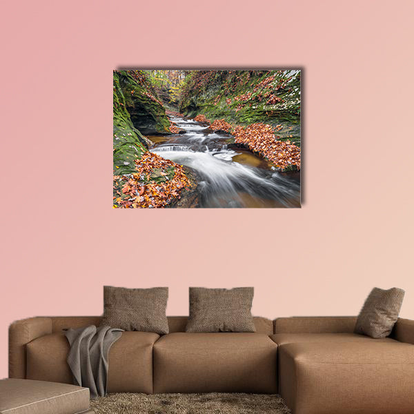 Water cascades down the Potholes, a series of rocky ledges wall art