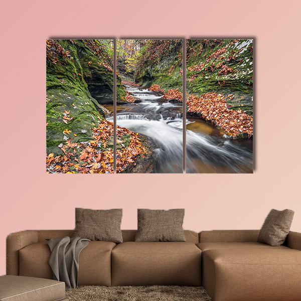 Water cascades down the Potholes, a series of rocky ledges wall art