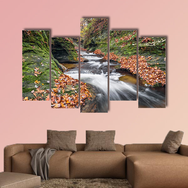 Water cascades down the Potholes, a series of rocky ledges wall art