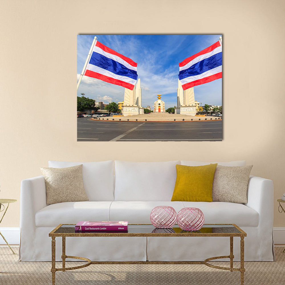 Democracy monument with blue sky and thai flag foreground in sunshine day, Bangkok, Thailand Multi panel canvas wall art