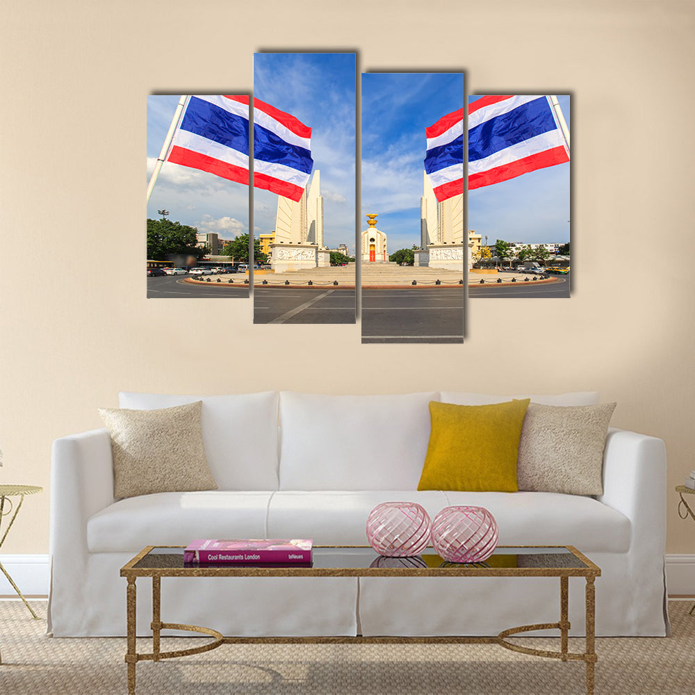 Democracy monument with blue sky and thai flag foreground in sunshine day, Bangkok, Thailand Multi panel canvas wall art