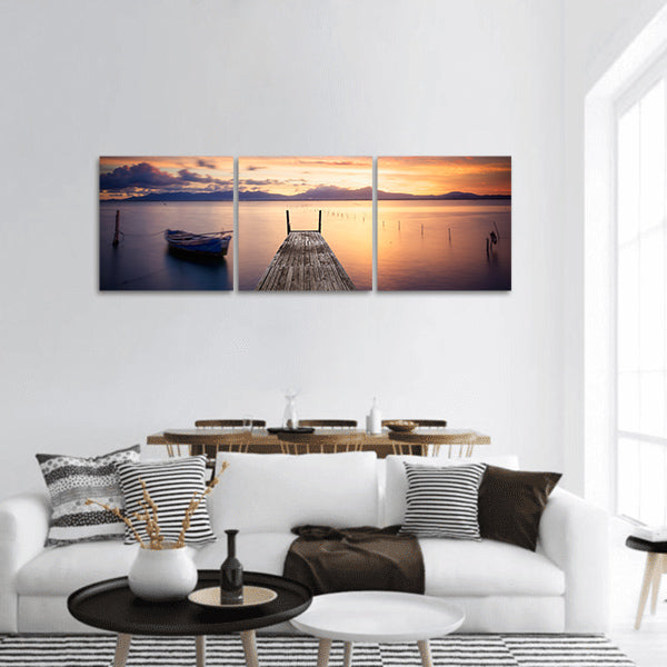 Pier with fishing vessels at sunset Panoramic canvas Wall Art