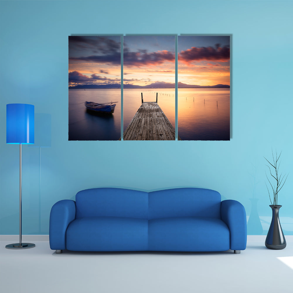 The Pier With Fishing Vessel At Sunset Multi Panel Canvas Wall Art