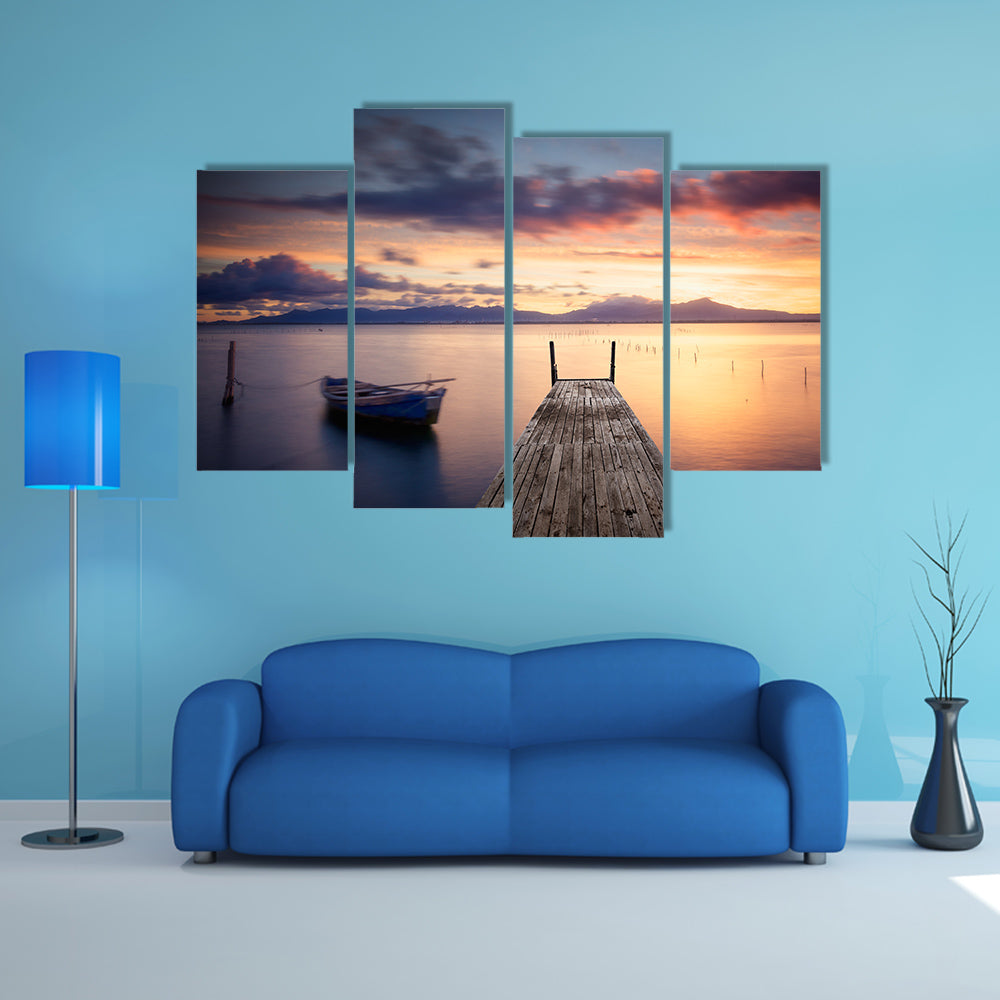 The Pier With Fishing Vessel At Sunset Multi Panel Canvas Wall Art