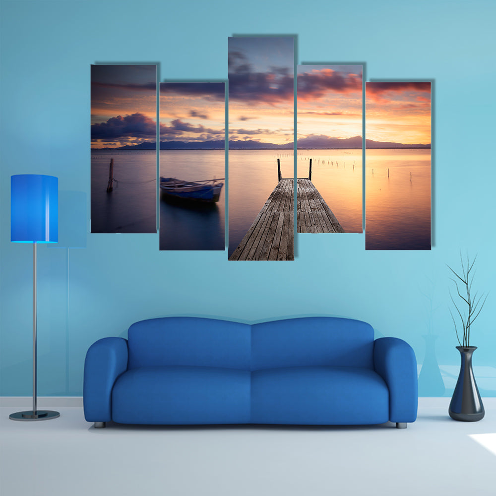 The Pier With Fishing Vessel At Sunset Multi Panel Canvas Wall Art