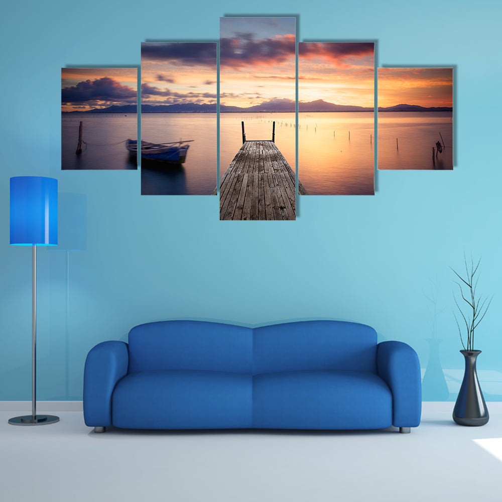 The Pier With Fishing Vessel At Sunset Multi Panel Canvas Wall Art