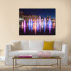 Musical fountain with colorful illumination at night multi panel canvas wall art