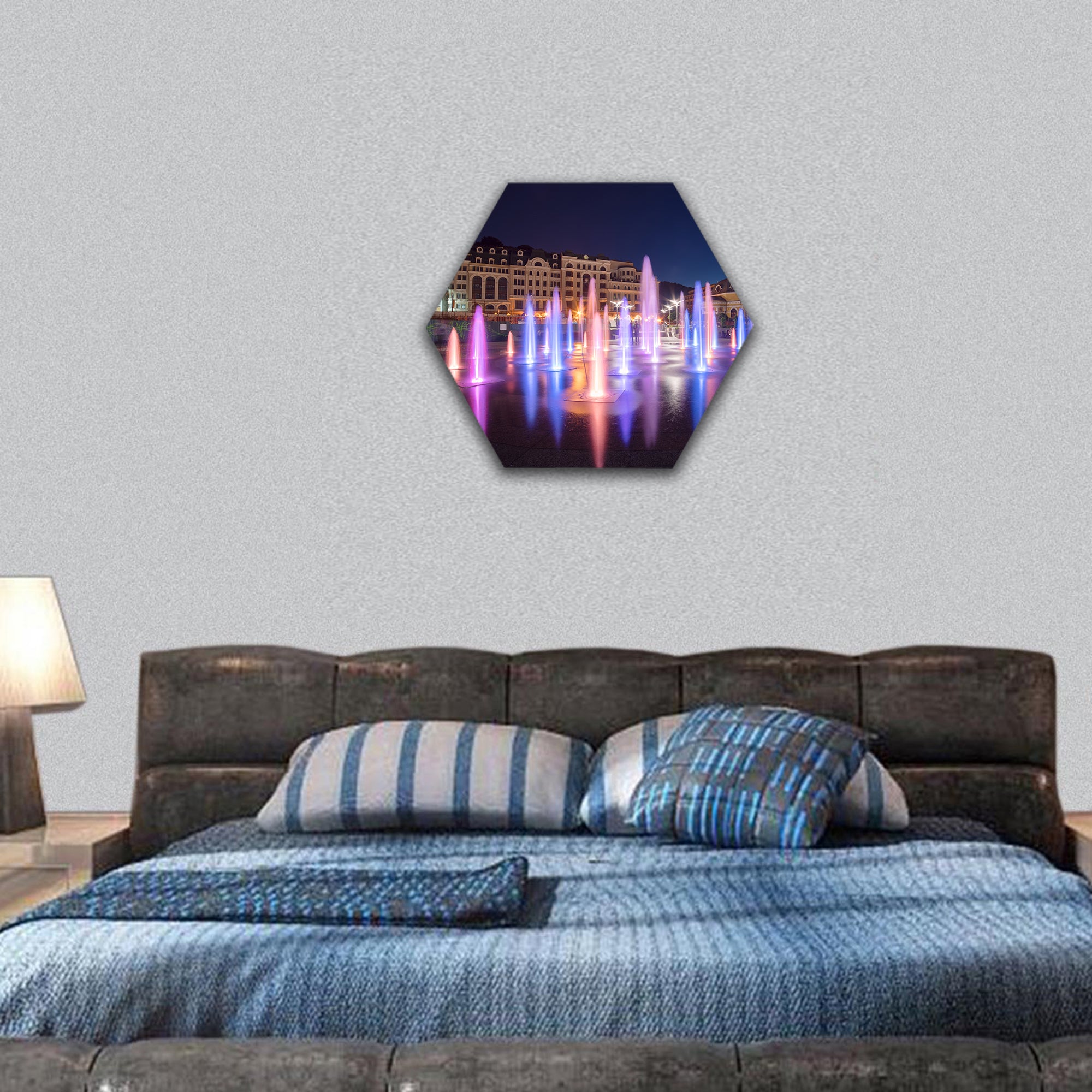 Musical fountain with colorful illumination at night hexagonal canvas wall art