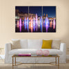 Musical fountain with colorful illumination at night multi panel canvas wall art