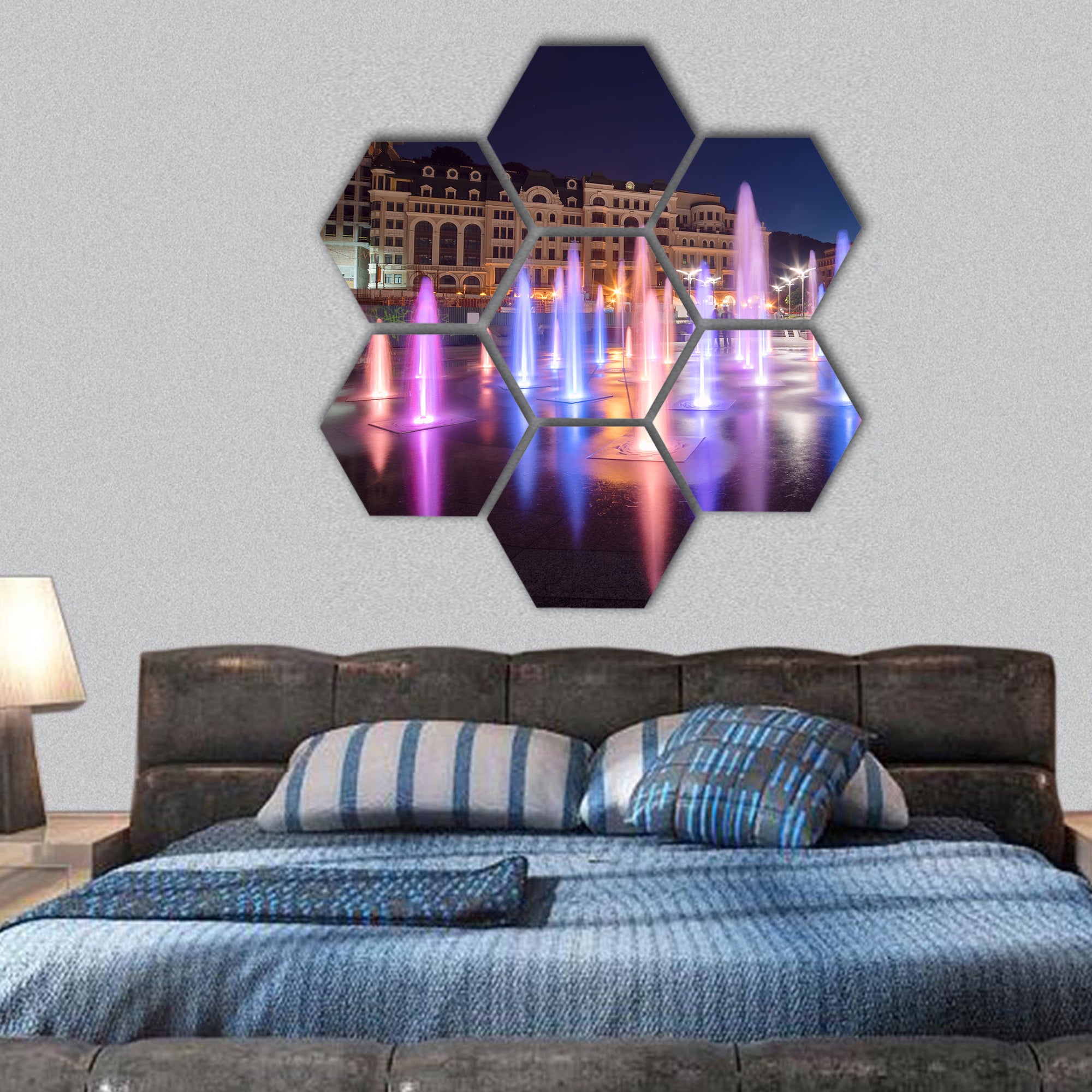 Musical fountain with colorful illumination at night hexagonal canvas wall art