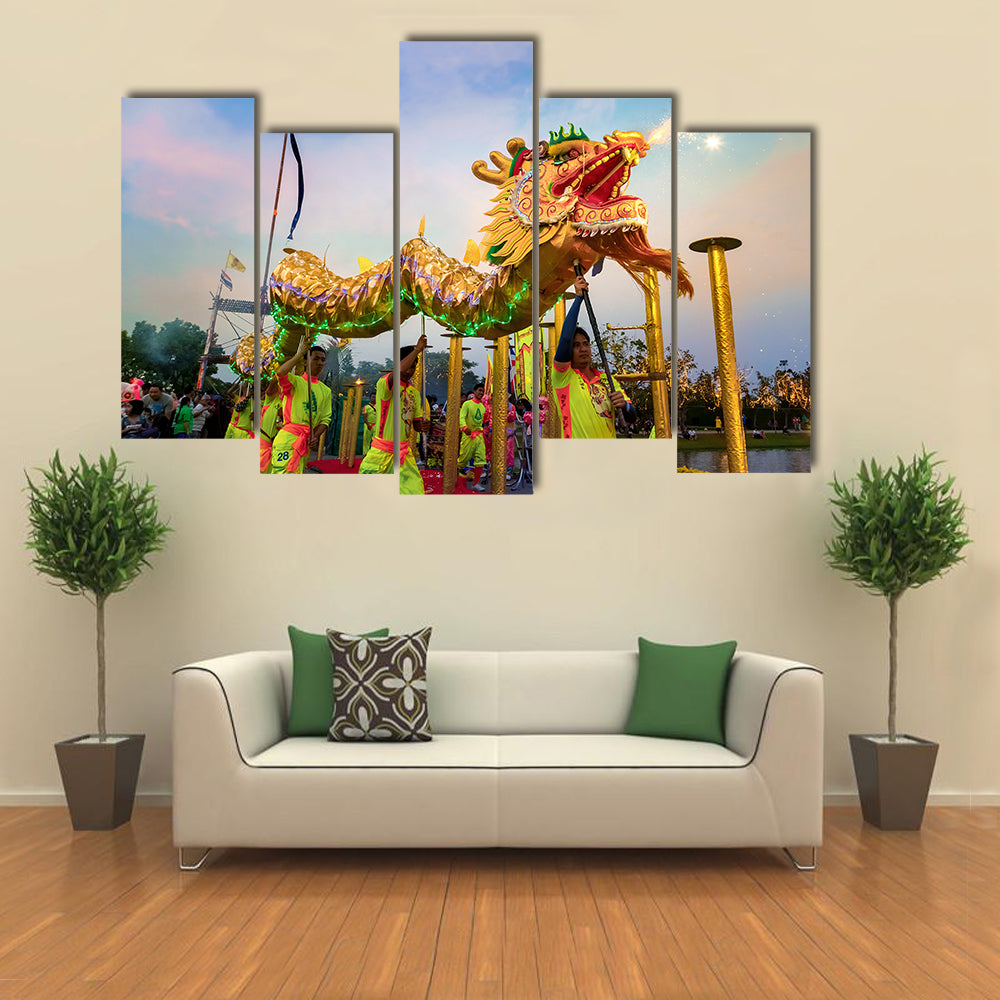 BANGKOK, THAILAND - A group of people perform a dragon dance during Chinese new year's celebration Multi Panel Canvas Wall Art
