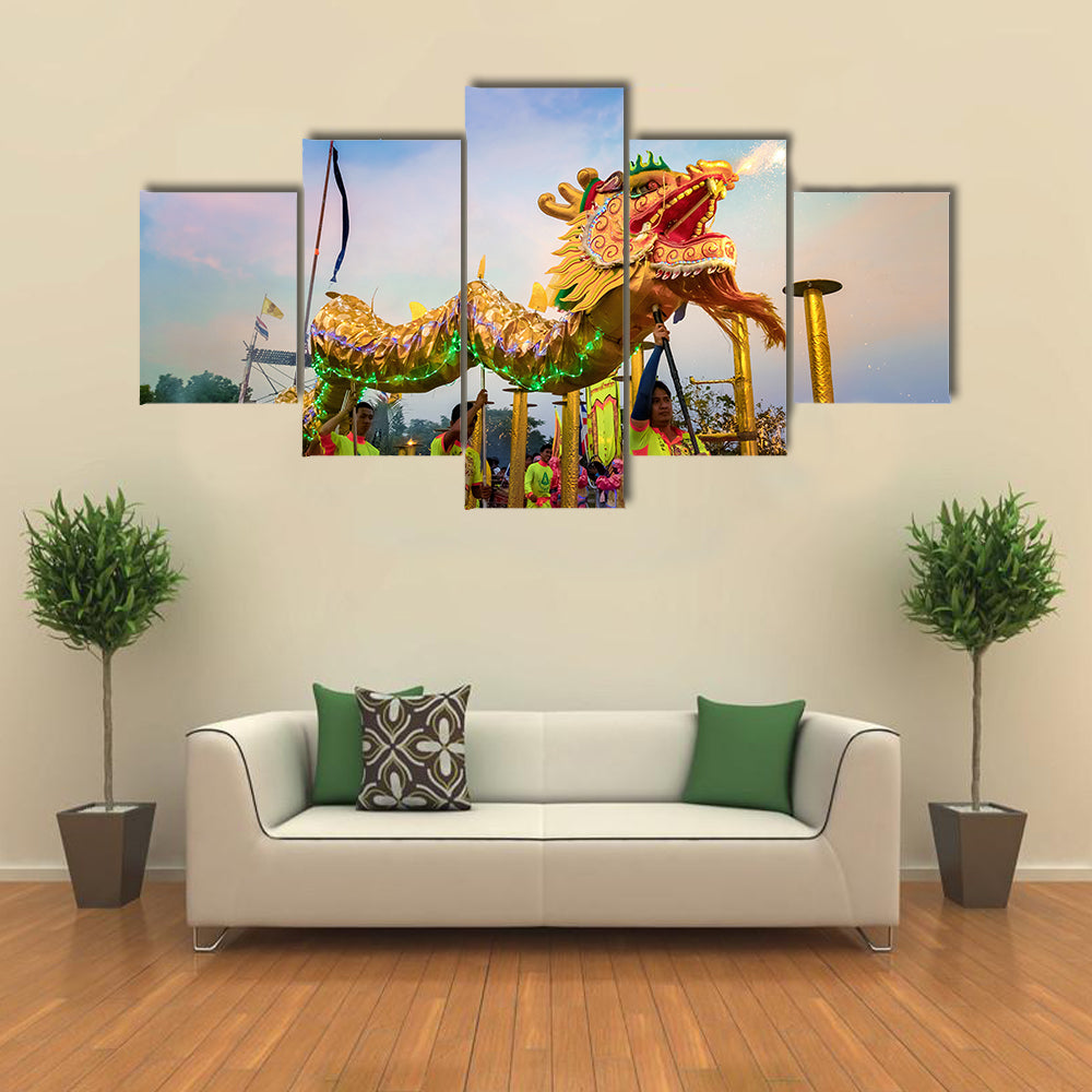 BANGKOK, THAILAND - A group of people perform a dragon dance during Chinese new year's celebration Multi Panel Canvas Wall Art