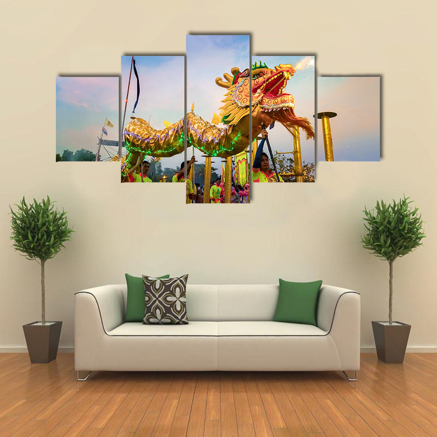 BANGKOK, THAILAND - A group of people perform a dragon dance during Chinese new year's celebration Multi Panel Canvas Wall Art