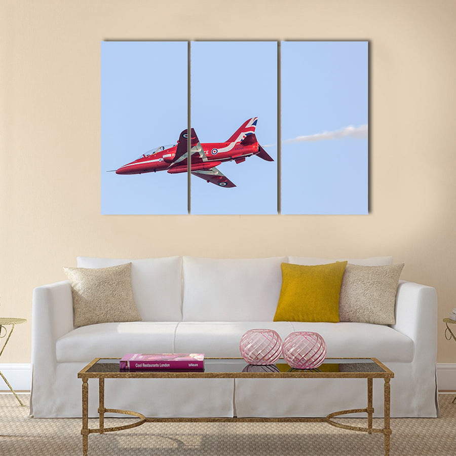 Royal Air Force Aerobatic Team Red Arrows performs in an airshow over the Abu Dhabi Corniche multi panel canvas wall art