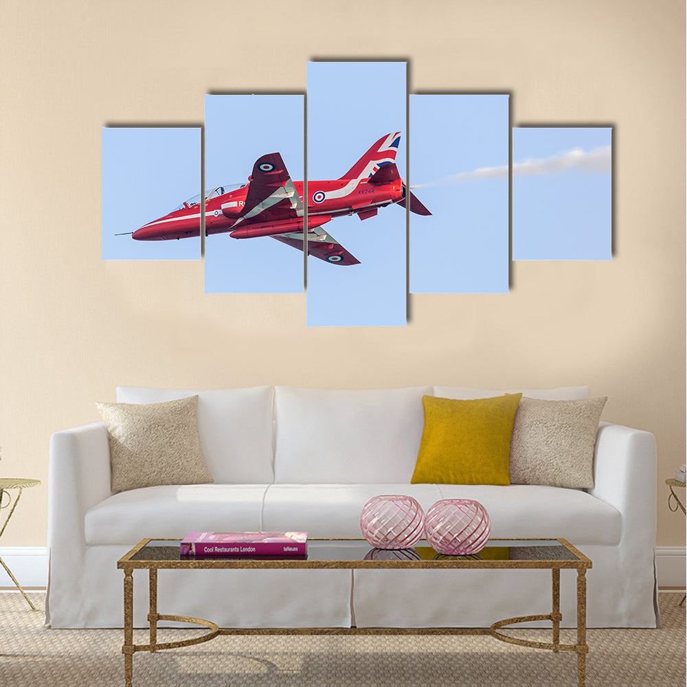 Royal Air Force Aerobatic Team Red Arrows performs in an airshow over the Abu Dhabi Corniche multi panel canvas wall art