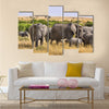 Group of elephants standing in the wild bush of Africa. multi panel canvas wall art