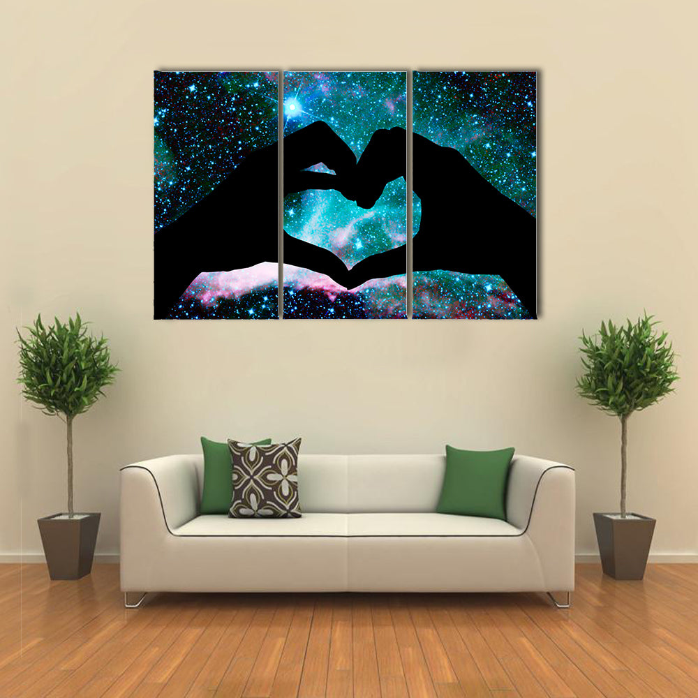 Hands in the shape of a heart, starry night background multi panel canvas wall art