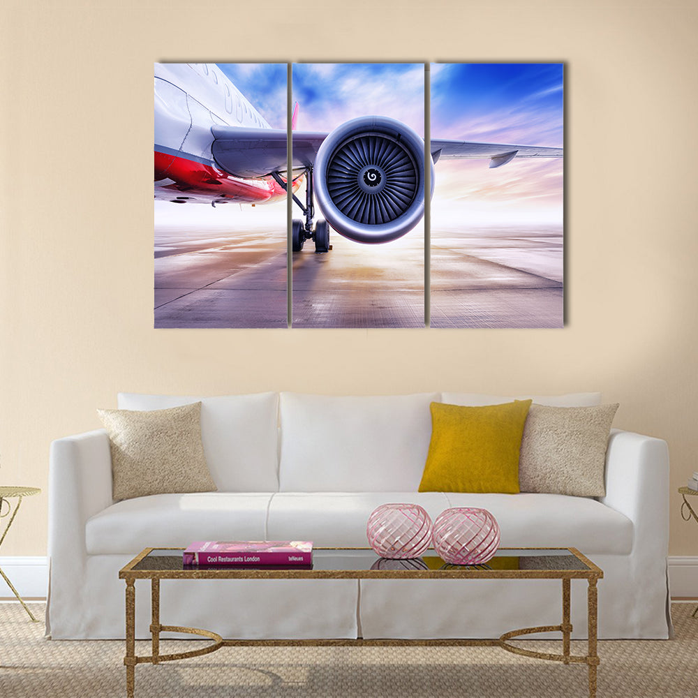 airliner on the airfield multi panel canvas wall art