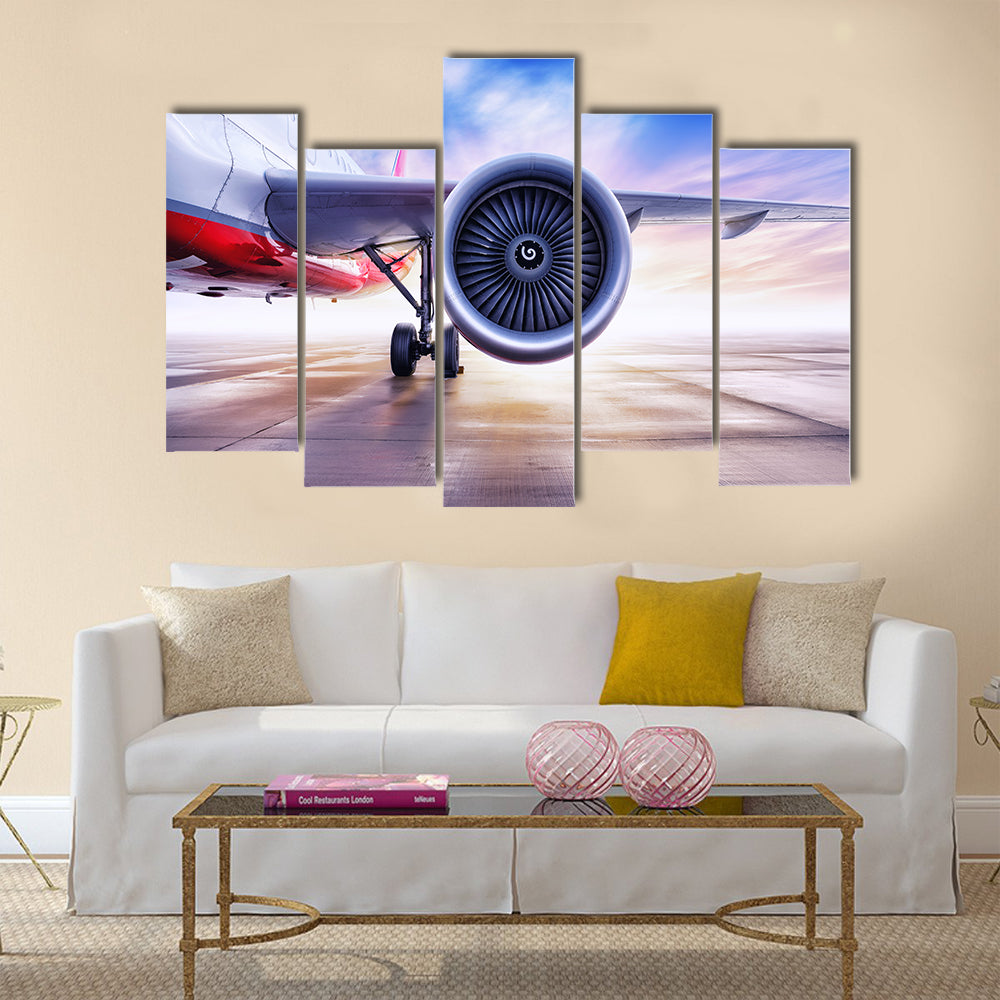 airliner on the airfield multi panel canvas wall art