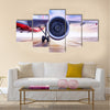 airliner on the airfield multi panel canvas wall art