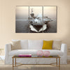 Military Drone aircraft launching from an aircraft carrier on a strike mission 3d rendering multi panel canvas wall art