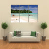 Vanuatu boys cross by foot and boat at low tide the channel over the sand bar Multi panel canvas wall art