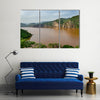 Landscape including calm brown water of Lake Ring Road Cameroon Multi panel canvas wall art