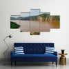 Landscape including calm brown water of Lake Ring Road Cameroon Multi panel canvas wall art