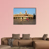 People arriving for an early morning mass in Mexico City multi panel canvas wall art