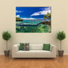 Natural infinity rock pool with palm trees over tropical ocean lagoon multi panel canvas wall art