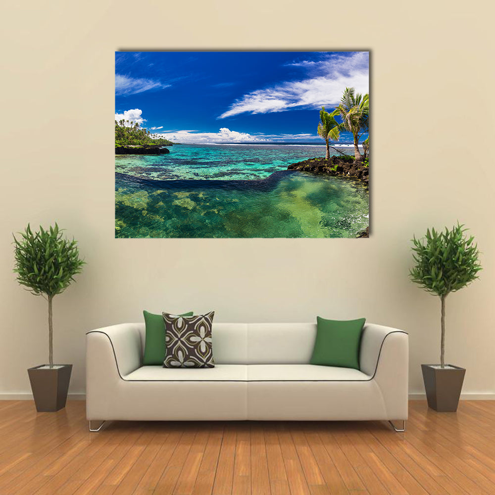 Natural infinity rock pool with palm trees over tropical ocean lagoon multi panel canvas wall art